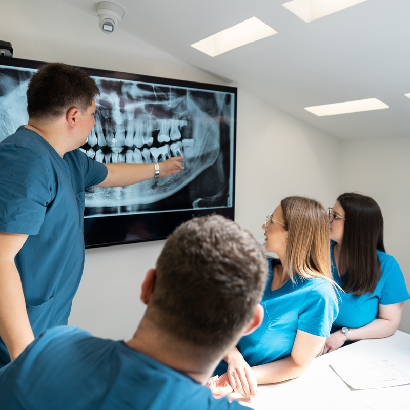 dental students looking at xrays