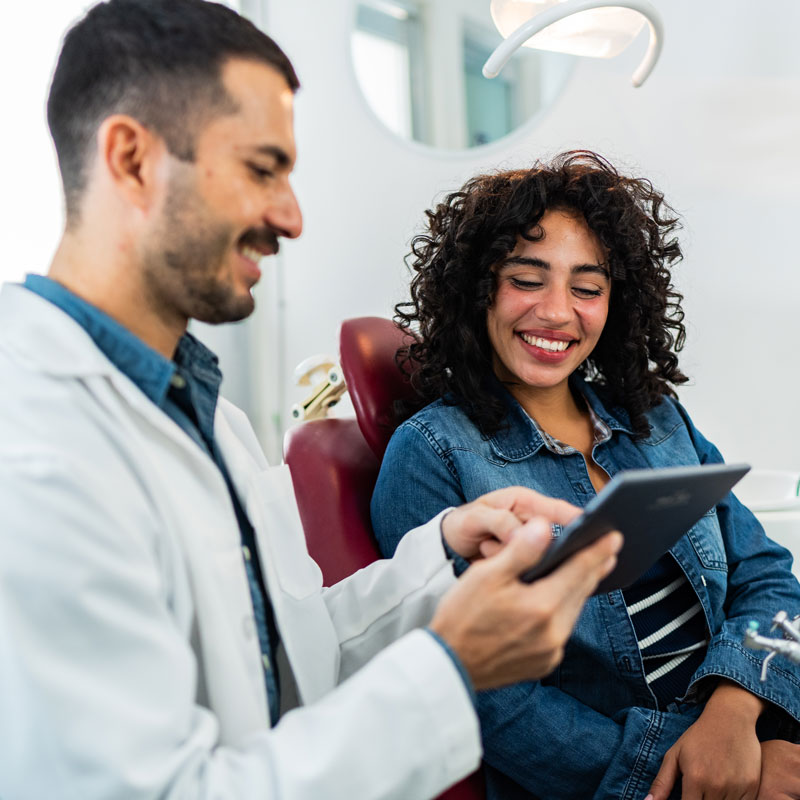 dental assistant and patient