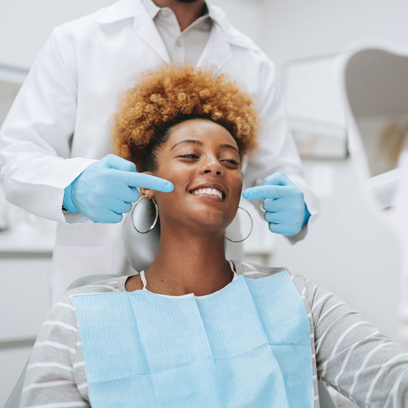dental assistant and patient